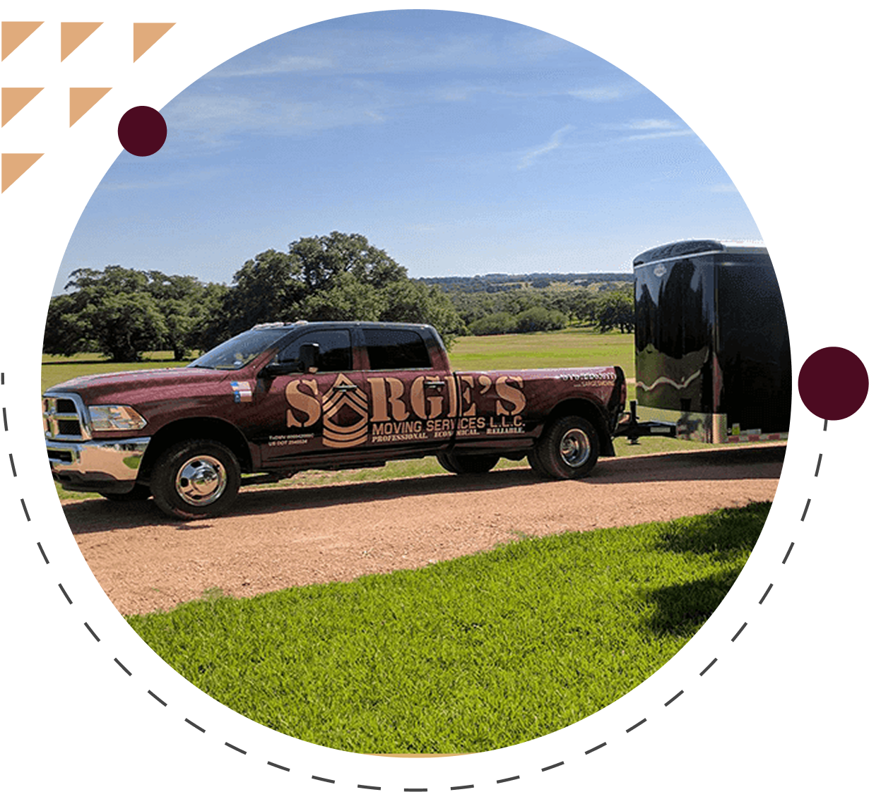 Moving truck with trailer on scenic road.
