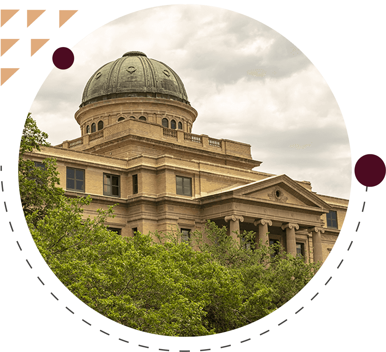 Historic building with dome and cloudy sky.