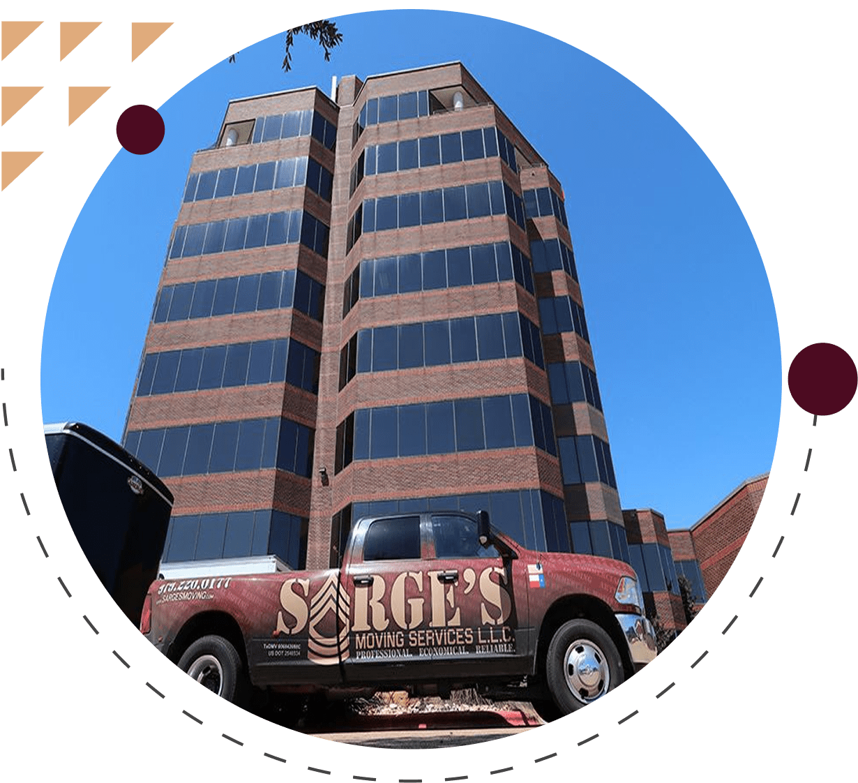 Moving truck parked in front of building.