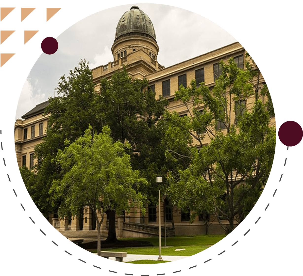 Historic building with dome and trees.