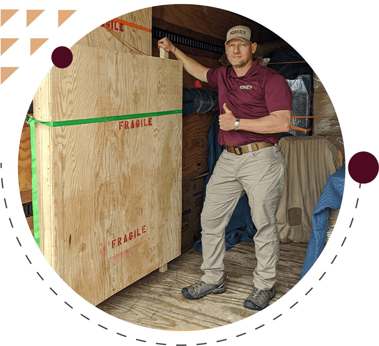 Man giving thumbs up beside fragile crate.